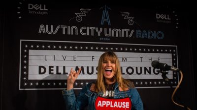 Grace Potter holding on-air sign