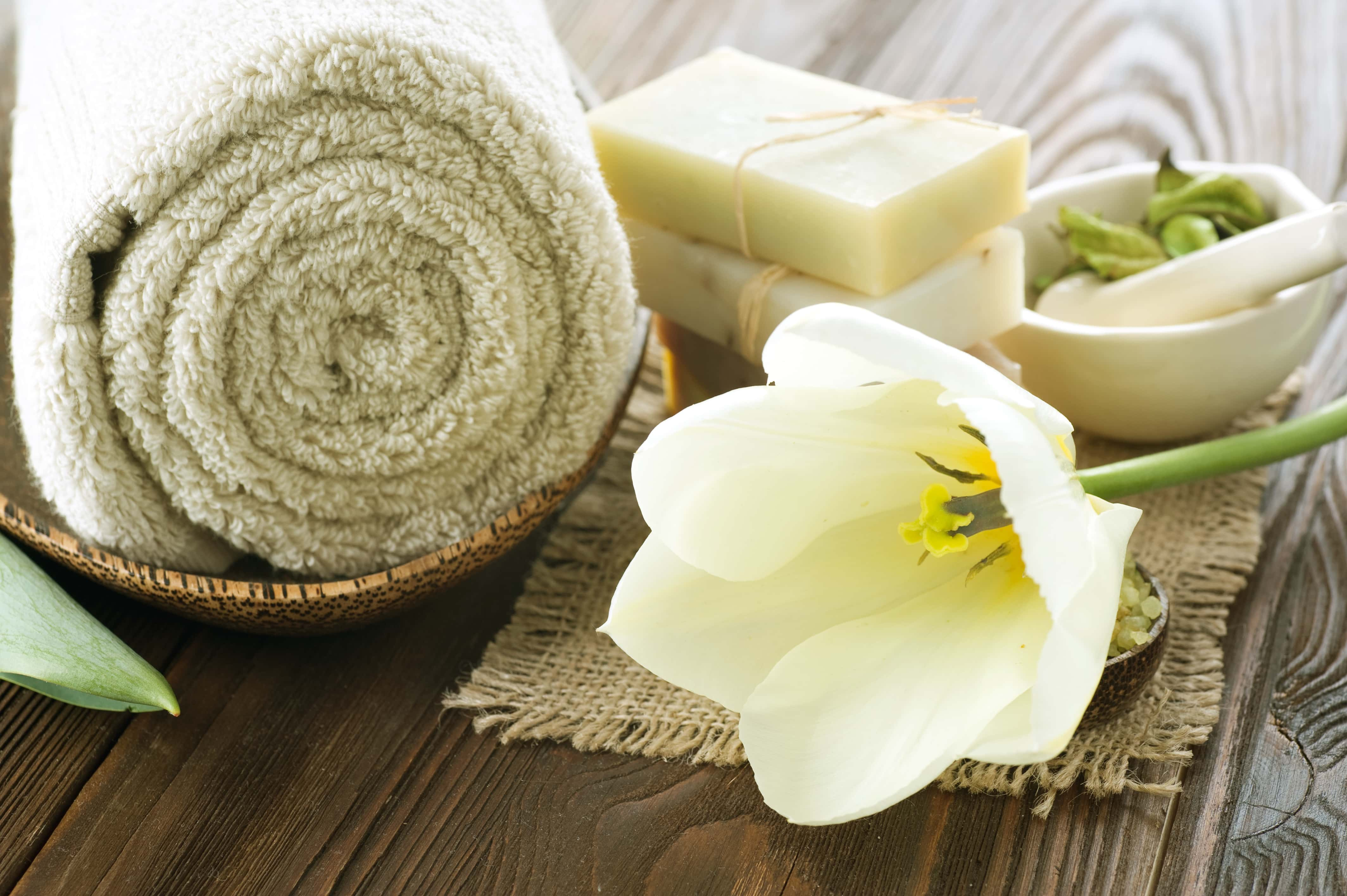 bath towel, soap, flower