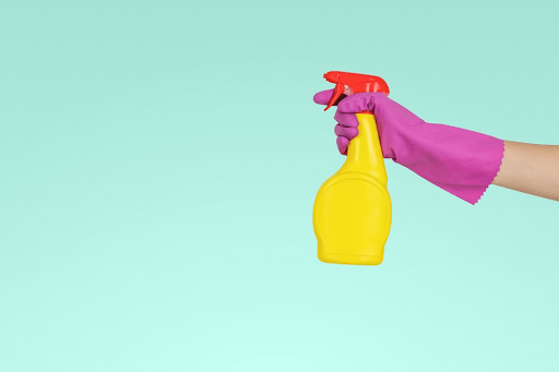 person holding cleaning product