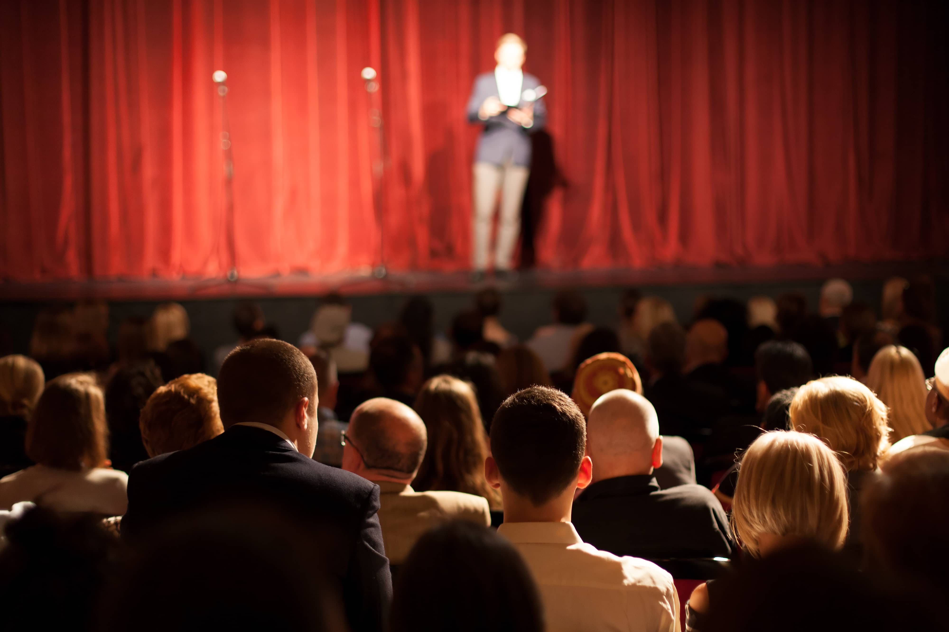 Stand up comedian on stage.