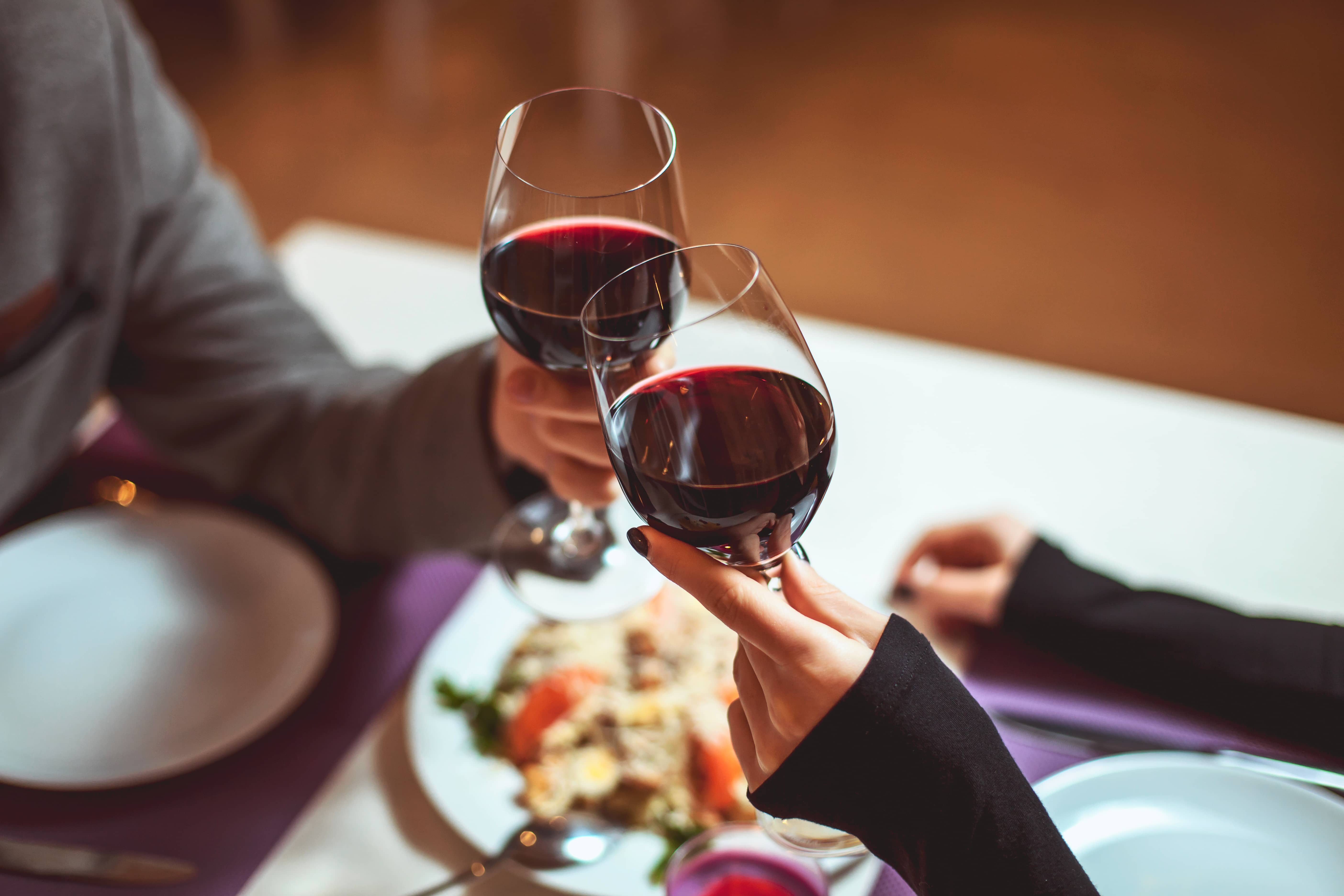 Two glasses of red wine in luxury restaurant.