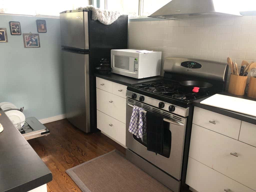 Deb's old refrigerator, oven, and the cabinets she is replacing with new stuff