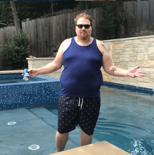 Jason in front of his pool. 