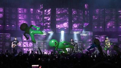 Mark Hoppus, Travis Barker and Matt Skiba of Blink-182 performs in concert at Cellairis Amphitheatre at Lakewood on July 27, 201