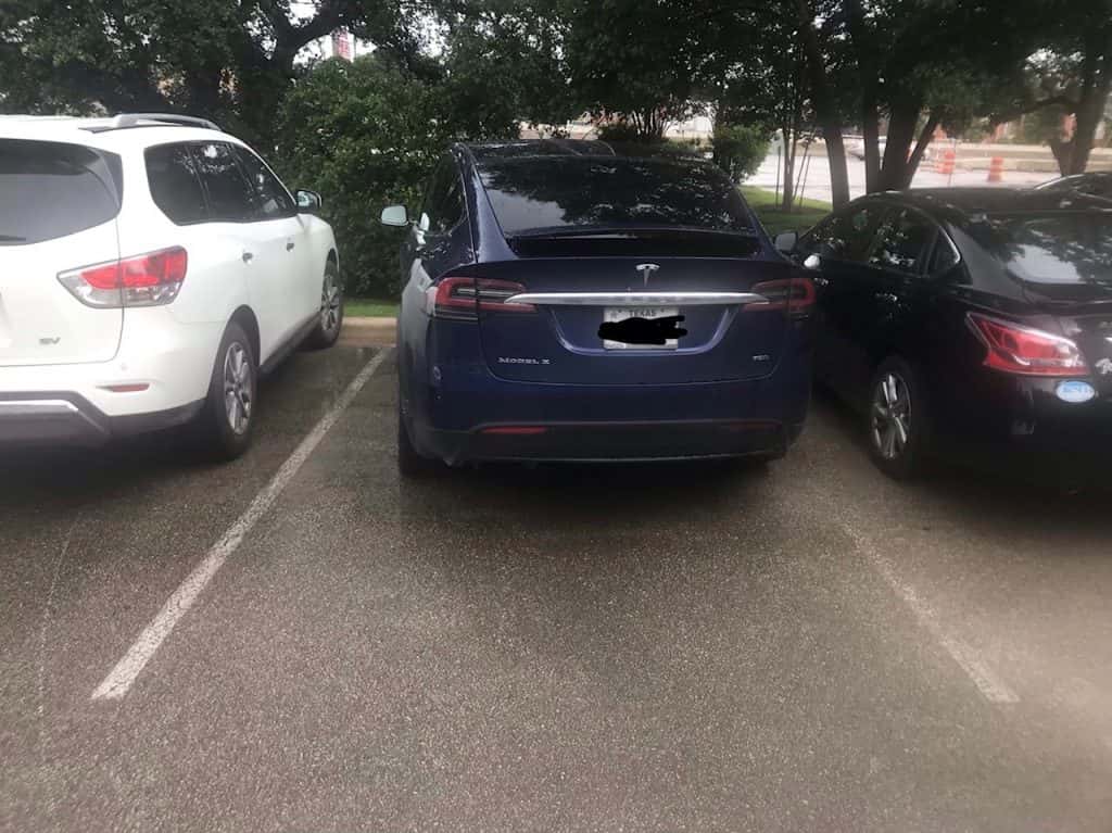 Jason's Tesla parked badly.