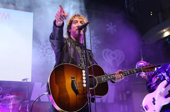 Musician Tom Higgenson of Plain White T's performing onstage.