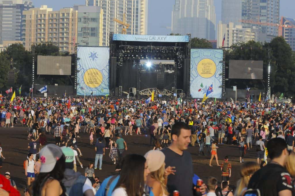 People standing in large crowd at ACL fest