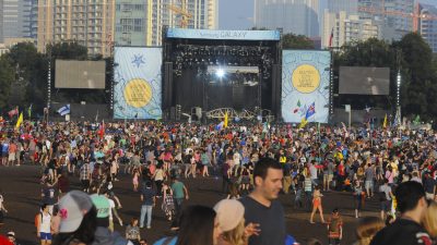 People standing in large crowd at ACL fest