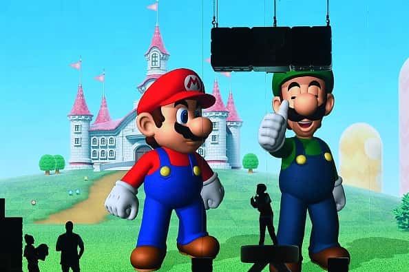 Mario and Luigi characters on stage
