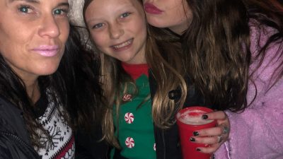 Deb and friends at a Christmas Block Party.