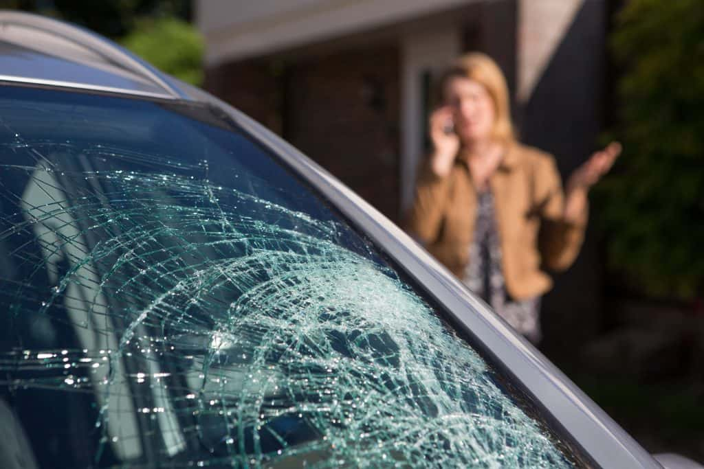 Cracked windshield on a car.