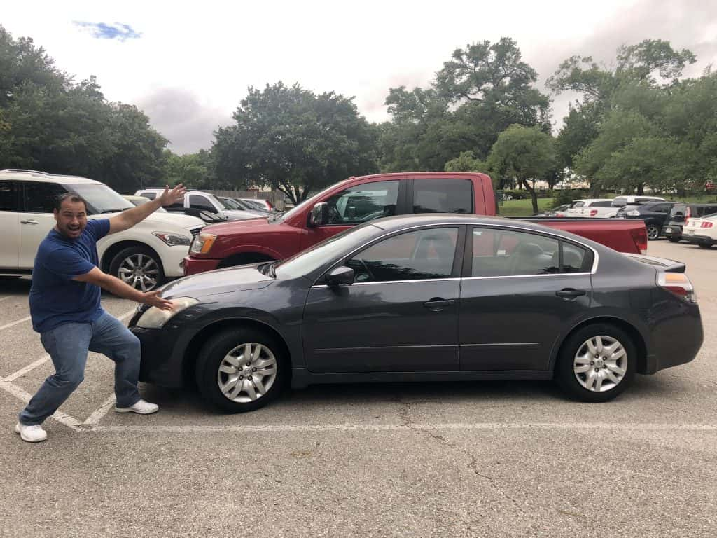 Producer Nick showing off his brand new Nissan Altima.