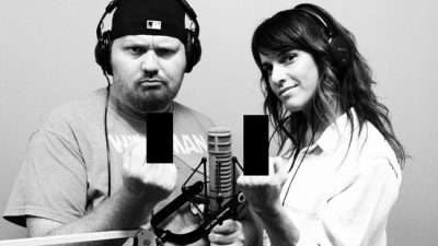 Jason and Deb in the studio with the finger blocked out.