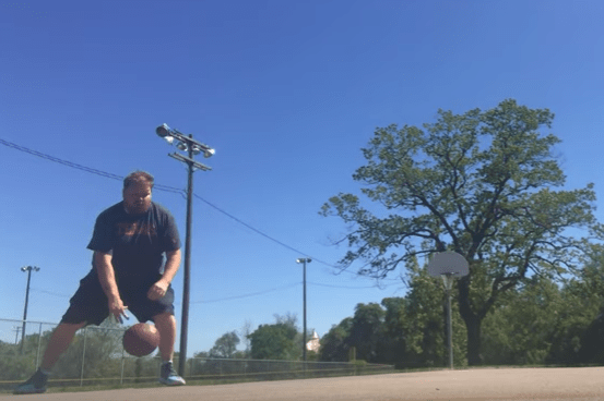 Jason playing basketball.