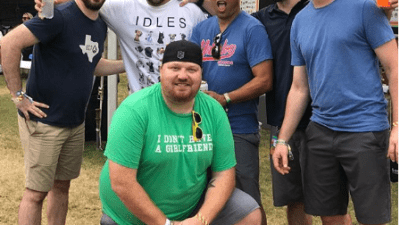 Jason and his friends posted up together in a photo all together at ACL Fest 2018.