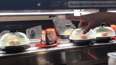 Deb at revolving sushi.