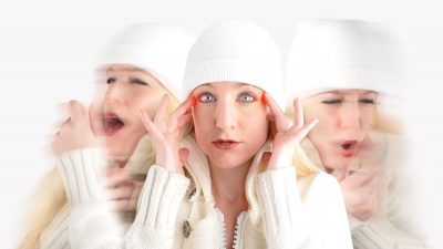 A lady showing the three different symptoms of phlegm or a sinus infection.