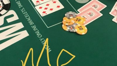 Jason playing poker at a table in Las Vegas for the World Series Of Poker.