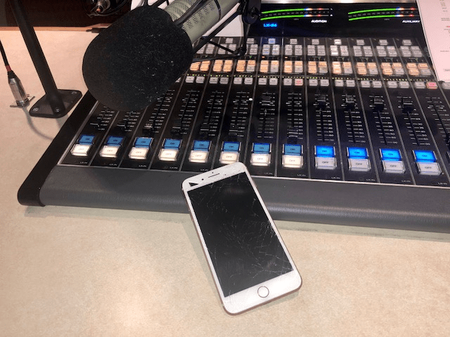 Broken iphone on studio board