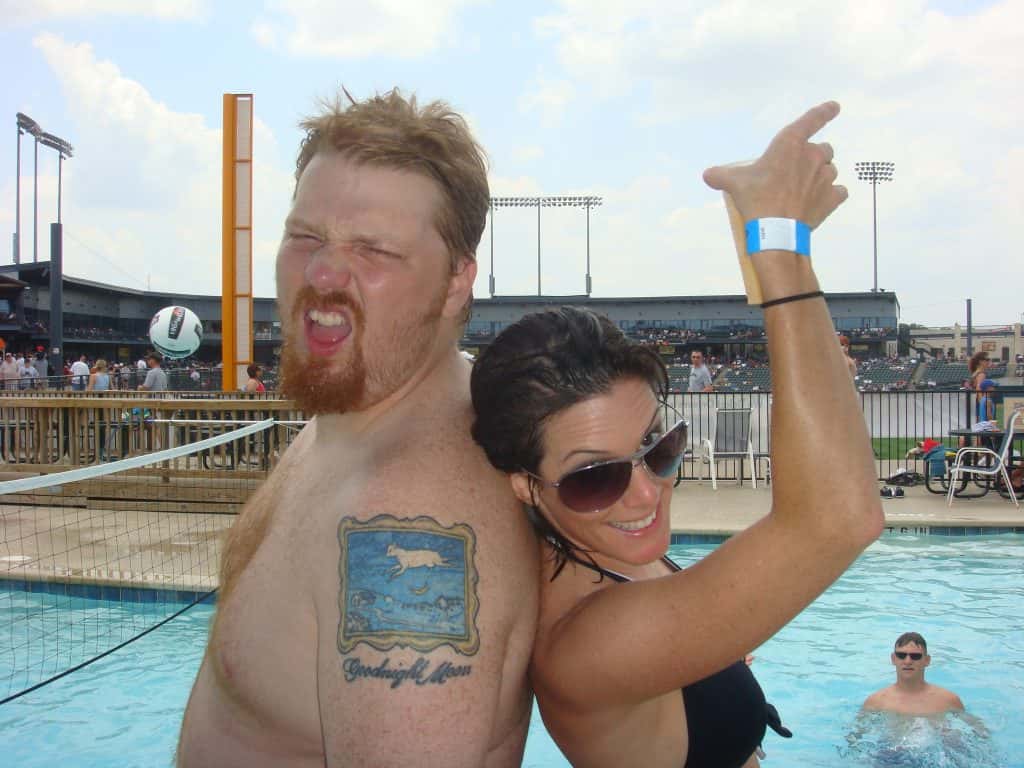 Jason and Deb posing back to back at the Round Rock Express pool