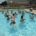 Memorial Day Drunk Fight: Jason diving to return a serve while playing volleyball in the Round Rock Express pool