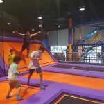 Nick And Jason Hoping Around Altitude Trampoline Park: Producer Nick jumping off a slanted trampoline