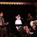 101X-Session With AJR: AJR answering fan questions on stage at Spiderhouse Ballroom