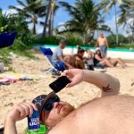 Football Views... At The Beach : View of Jason with a Bud Light on the beach in Hawaii. 
