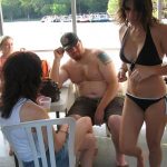 Memorial Day Drunk Fight: Deb walking past Jason and his ex-wife while on a boat