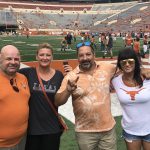 Views From The Field : Deb and three friends on the Longhorn field before the game. 