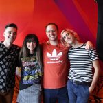 101X-Session with half•alive at Aviator Nation: Half Alive posing with a fan who attended the 101X Session