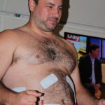 Nick and Jason Get Zapped: Nick, producer of the Jason and Deb show, is getting zapped by Neufit in the 101X Studio