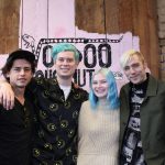 101X-Session with Dreamers: Dreamers posing with fan at an X-Session