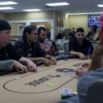Beat The Dick Poker Tournament : poker players around a poker table