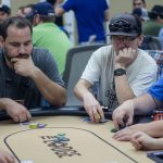 Beat The Dick Poker Tournament : Producer Nick sitting at a poker table with a dejected look on his face