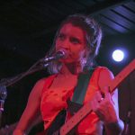 101X Homegrown Live Presents Pennyfest 2019: Woman singing and playing bass