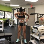 Deb's NeuFit 8 Pack Part 2 : deb with neufit pads on her abs 