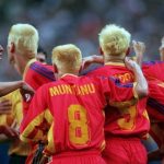 Team Romania: 1998 World Cup: Team Romania 1998 in World Cup with all blonde hair playing in group huddle 