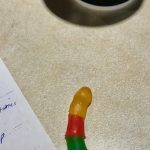 Producer Nick's Franken-Dick : A mashed up piece of yellow, red and green candy. 