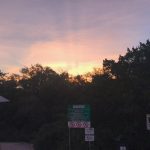Producer Nick And His Mom Explore Mount Bonnell : Sunrise view and sign of Mount Bonnell. 