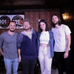 101X-Session With Mt. Joy at Scoot Inn: Mt. Joy meet and greet picture with a couple