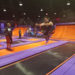 Nick And Jason Hoping Around Altitude Trampoline Park: Producer Nick jumping on a floor length trampoline at an indoor trampoline park