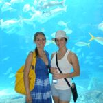 #TBT Bud Light Party Cruise : Deb and former ‘Sorority Intern’ Cassandra at the Bahamas Bud Light Party Cruise from 2009 in front of fishes in an aquarium. 
