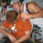 Memorial Day Drunk Fight: A listener posing next to a sleeping Jason