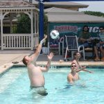 Memorial Day Drunk Fight: Jason serving a volleyball in the Round Rock Express pool