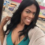 Producer Imari's Trip To Cancun : Producer Imari at a hotel rooftop pool bar. 