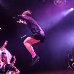 101X Concert Series Featuring YUNGBLUD: YUNGBLUD jumping in the air on stage