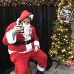 Santa's Got His Medicine Handy : Jason dressed as Santa for the 101X Sleigh Bells Cinema. 