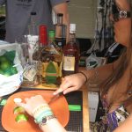 Cassandra cutting up some limes at the bar : #TBTwJnD ACL 2009: The Mud Year
