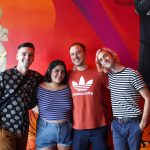 101X-Session with half•alive at Aviator Nation: Half Alive posing with a fan